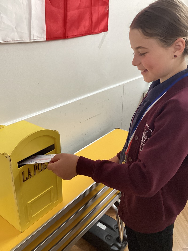 Child posting letter