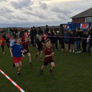 Boy running in the cross country