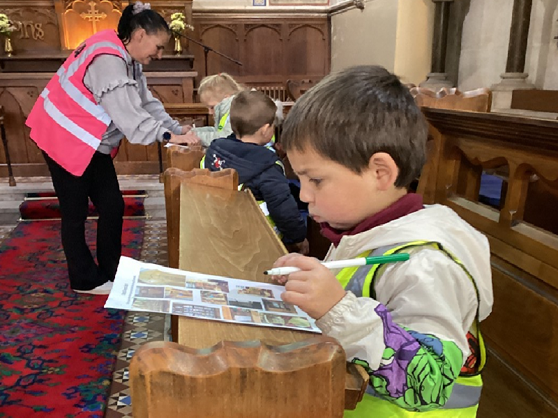 Child in a church pew.