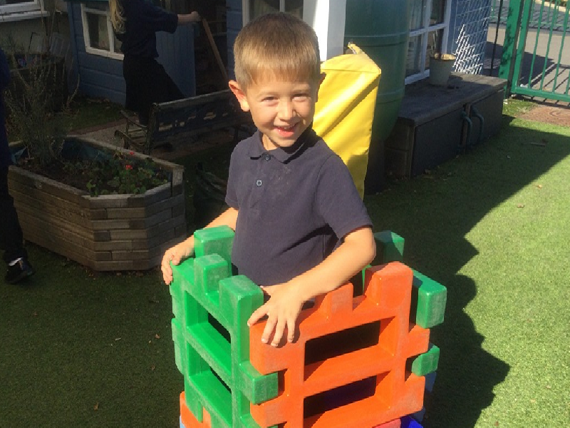 Child playing with school appartus.