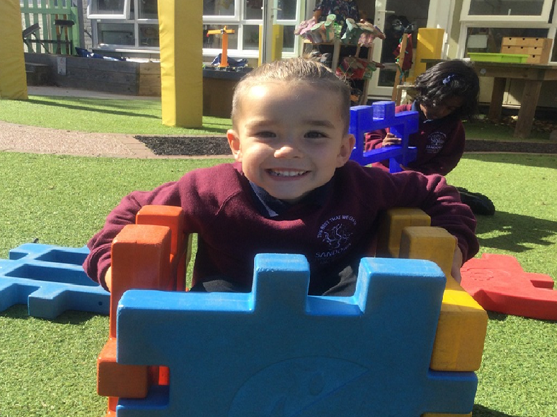 Child playing in playground.